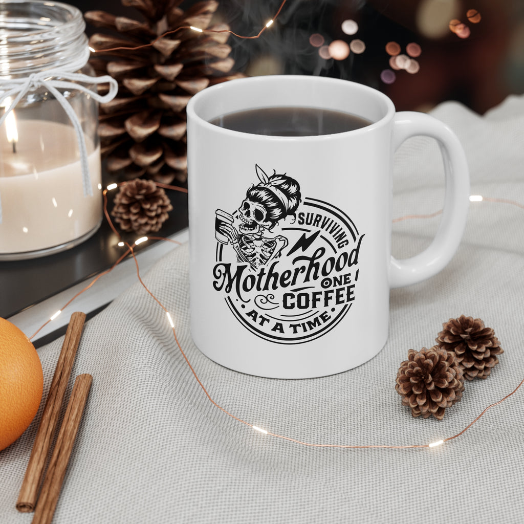 Surviving Motherhood One Coffee at a Time" Ceramic Mug